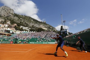 France Gael Monfils hits a return to Gilles Muller of Luxembourg during their Monte-Carlo ATP Masters Series tournament tennis match, on April 11, 2016 in Monaco. AFP PHOTO / VALERY HACHE / AFP / VALERY HACHE (Photo credit should read VALERY HACHE/AFP/Getty Images)